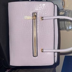 A purple vegan leather purse